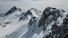 Overflight of mountain peaks in the Sierra Nevada in the winter